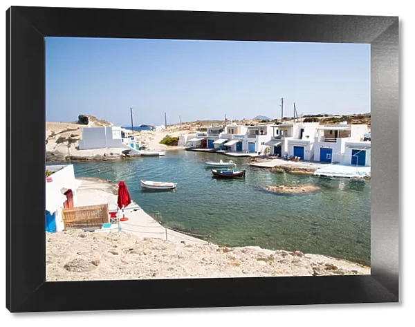 Traditional fishermens houses by the sea in Milos, Cyclades, Aegean Sea