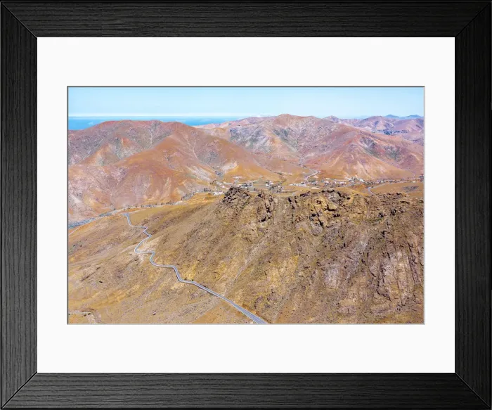 Framed Print : Aerial view of desert road in the barren landscape, Mirador del Risco de las Penas Framed Print : Aerial view of desert road in the barren landscape, Mirador del Risco de las Penas