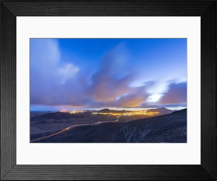 Framed Print : Car trail lights on desert road crossing the barren land at dusk, Vallebron lookout Framed Print : Car trail lights on desert road crossing the barren land at dusk, Vallebron lookout