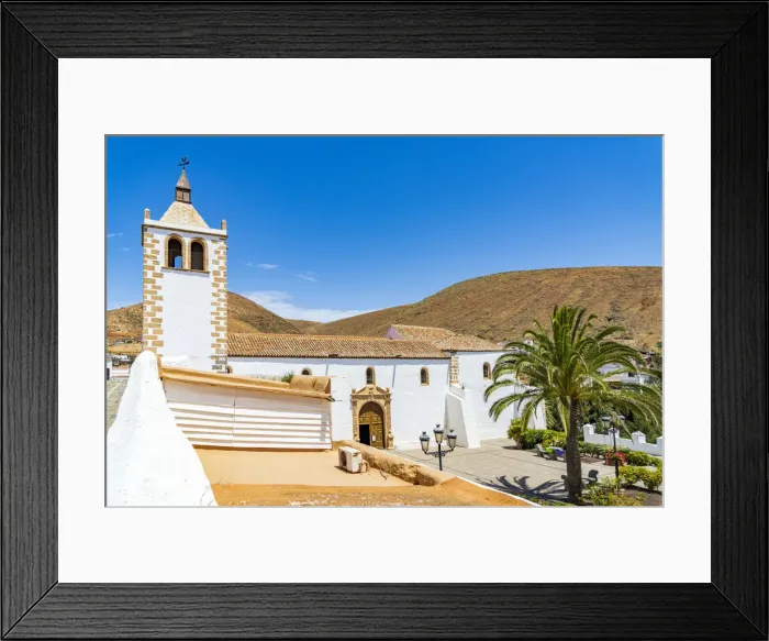 Framed Print : Bright blue sky over the whitewashed church of Iglesia de Santa Maria, Betancuria Framed Print : Bright blue sky over the whitewashed church of Iglesia de Santa Maria, Betancuria