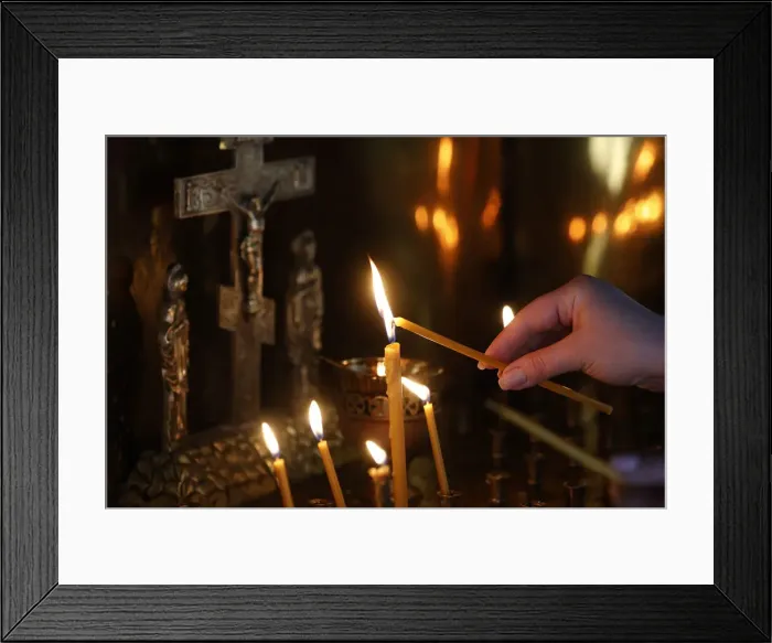 Framed Print : Faithful lighting a candle in Saint Teaodor Tiron (Ciuflea) Cathedral and Monastery Framed Print : Faithful lighting a candle in Saint Teaodor Tiron (Ciuflea) Cathedral and Monastery
