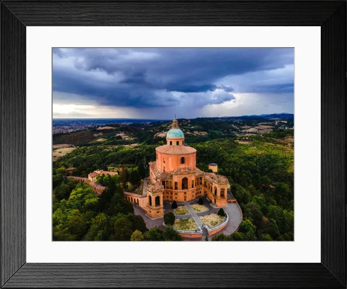 Framed Print : Sanctuary of Madonna di St. Luca, the symbol of Bologna, at sunset during a storm Framed Print : Sanctuary of Madonna di St. Luca, the symbol of Bologna, at sunset during a storm