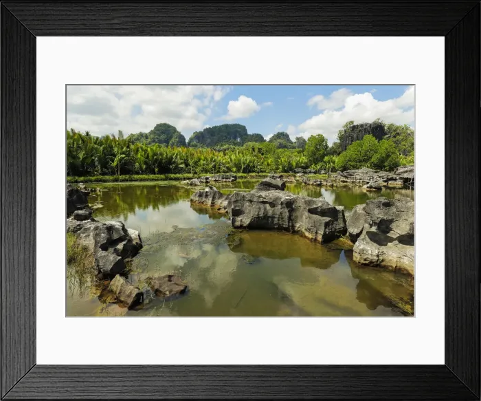 Framed Print : Typical eroded limestone outcrops and lake in karst region, Rammang-Rammang, Maros Framed Print : Typical eroded limestone outcrops and lake in karst region, Rammang-Rammang, Maros