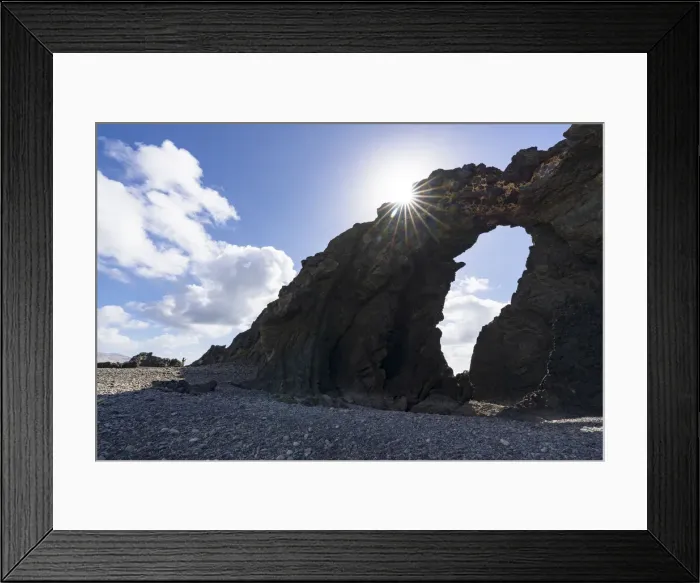 Framed Print : Majestic Arco del Juradonatural arch lit by sun on Pena Horadada beach, Betancuria Framed Print : Majestic Arco del Juradonatural arch lit by sun on Pena Horadada beach, Betancuria