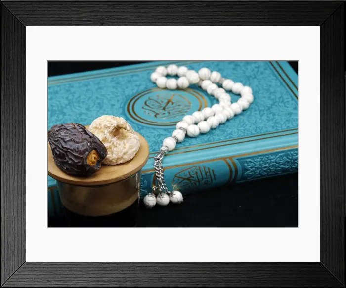 Framed Print : Holy Quran book with prayer beads and date, Ramadan concept, Muslim faith and religion Framed Print : Holy Quran book with prayer beads and date, Ramadan concept, Muslim faith and religion