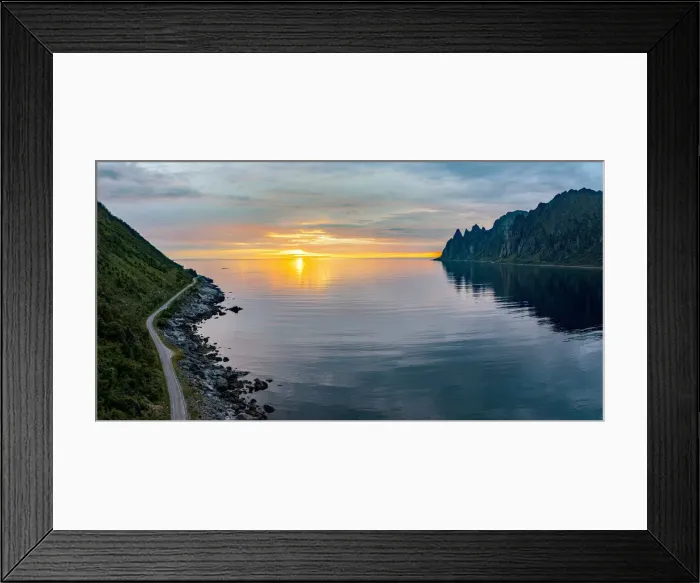 Framed Print : Empty asphalt road on edge of the arctic sea hit by the midnight sun, Ersfjord, Senja Framed Print : Empty asphalt road on edge of the arctic sea hit by the midnight sun, Ersfjord, Senja