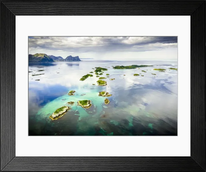 Framed Print : Cloudy sky over Bergsoyan Islands in the clear water of the fjord, Hamn I Senja, Skaland