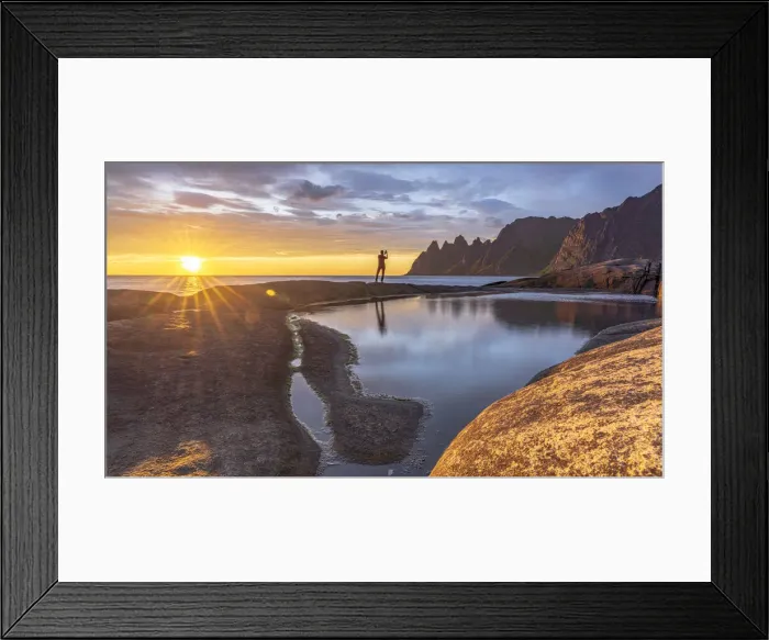 Framed Print : Man in the backlight sunset photographing the mountain peaks with smartphone, Tungeneset Framed Print : Man in the backlight sunset photographing the mountain peaks with smartphone, Tungeneset