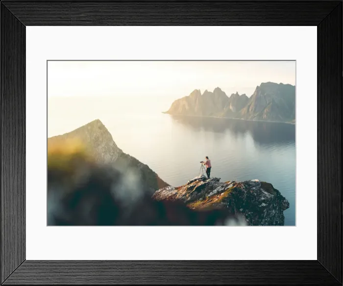 Framed Print : Photographer with tripod on Husfjellet mountain watching sunset on sharp peaks of mount Framed Print : Photographer with tripod on Husfjellet mountain watching sunset on sharp peaks of mount