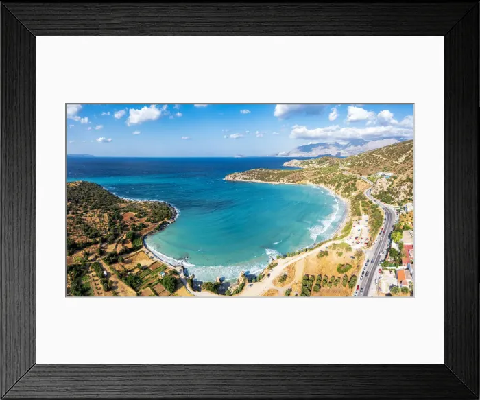 Framed Print : Aerial view of Almyros Beach washed by the turquoise sea in the gulf of Mirabella Framed Print : Aerial view of Almyros Beach washed by the turquoise sea in the gulf of Mirabella