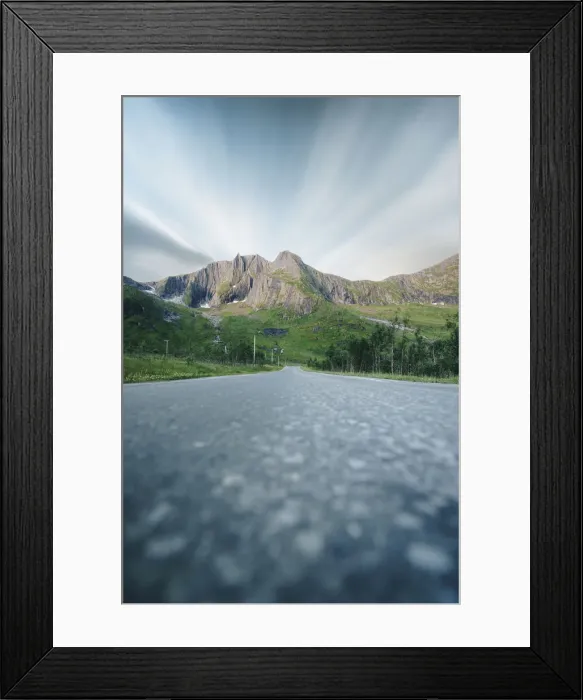 Framed Print : Long exposure of clouds over mountains view from the empty road, Senja, Troms county Framed Print : Long exposure of clouds over mountains view from the empty road, Senja, Troms county