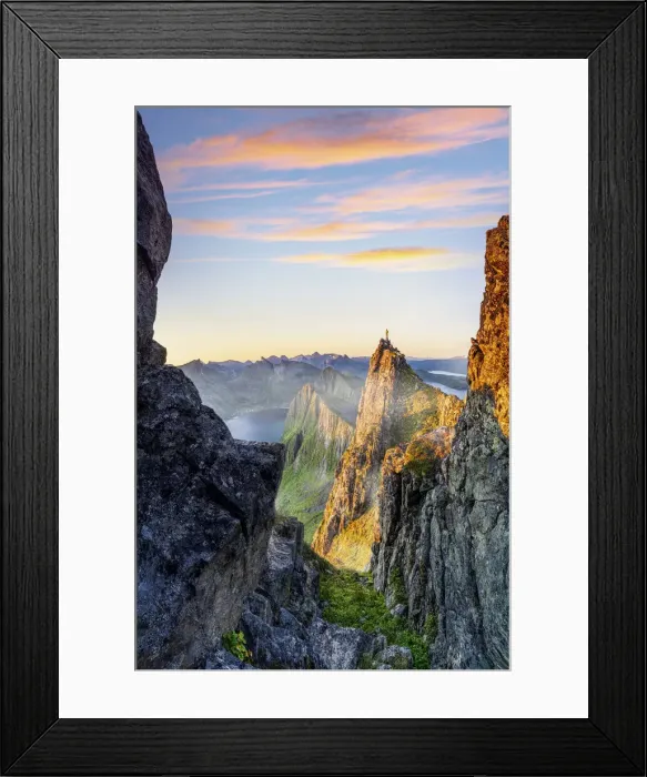 Framed Print : Hiker man admiring sunrise standing on top of Husfjellet mountain, Senja, Troms county Framed Print : Hiker man admiring sunrise standing on top of Husfjellet mountain, Senja, Troms county