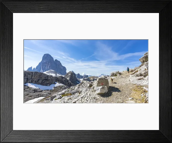 Framed Print : Hiker woman with dog walking on path to the majestic mountain Croda dei Toni in summer Framed Print : Hiker woman with dog walking on path to the majestic mountain Croda dei Toni in summer