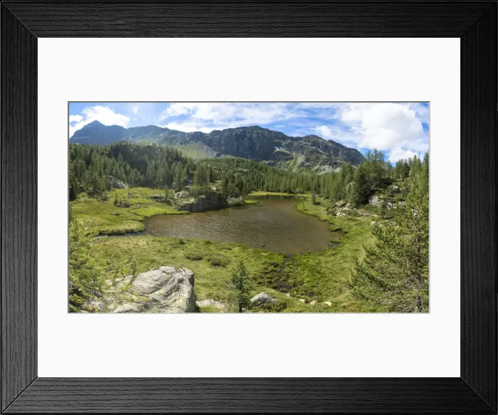 Framed Print : Mufule lake framed by green forest and mountains in summer, Valmalenco, Valtellina Framed Print : Mufule lake framed by green forest and mountains in summer, Valmalenco, Valtellina