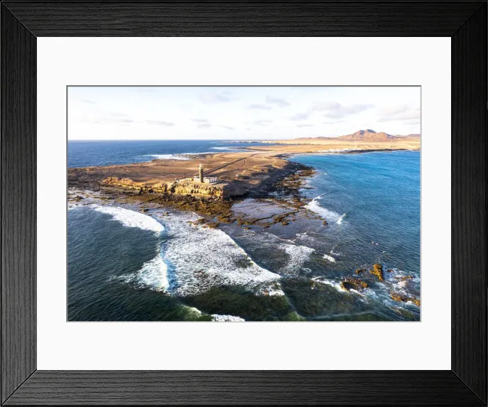 Framed Print : Sunset over the lighthouse of Punta Jandia (Faro de la Lola) washed by ocean waves Framed Print : Sunset over the lighthouse of Punta Jandia (Faro de la Lola) washed by ocean waves