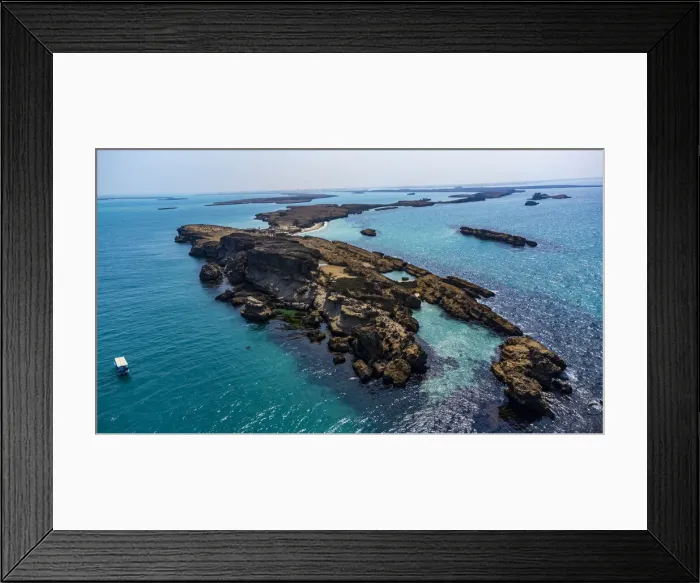 Framed Print : Aerial of a little boat in the Farasan islands, Kingdom of Saudi Arabia, Middle East