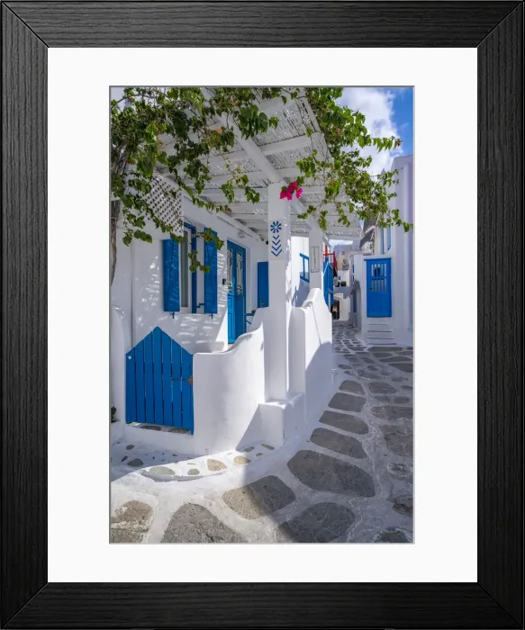 Framed Print : View of girl walking through whitewashed narrow street, Mykonos Town, Mykonos Framed Print : View of girl walking through whitewashed narrow street, Mykonos Town, Mykonos