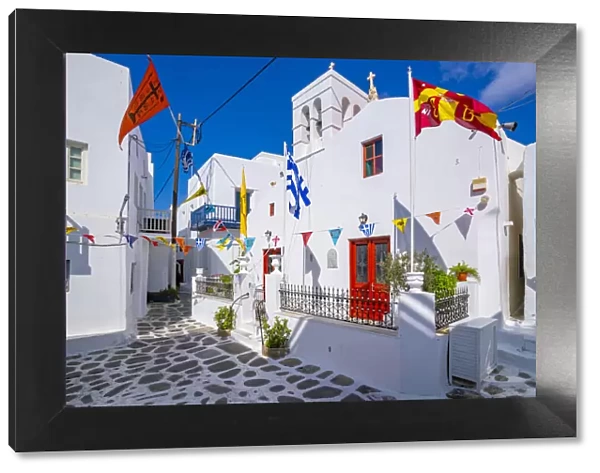 View of chapel and whitewashed narrow street, Mykonos Town, Mykonos, Cyclades Islands
