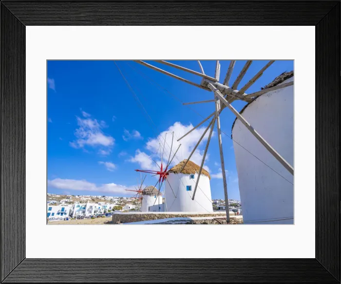 Framed Print : View of windmills and town in background, Mykonos Town, Mykonos, Cyclades Islands Framed Print : View of windmills and town in background, Mykonos Town, Mykonos, Cyclades Islands
