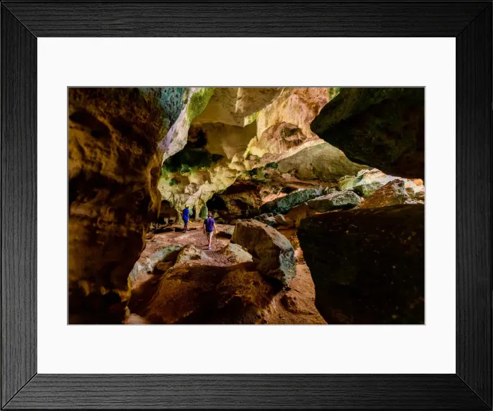 Framed Print : People exploring sea caves on North Caicos, Turks and Caicos Islands, Atlantic