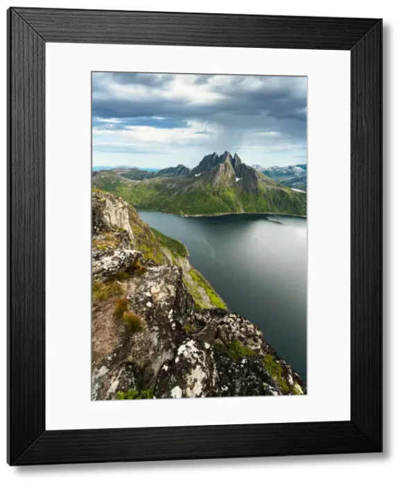 Framed Print : Cloudy sky over the calm water of Mefjord and majestic Breidtinden mountain, Senja island Framed Print : Cloudy sky over the calm water of Mefjord and majestic Breidtinden mountain, Senja island