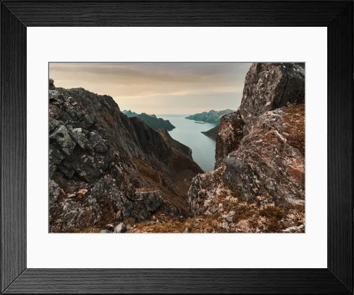 Framed Print : Oyfjorden fjord view from steep hiking trail through red rocks of mountains, Senja island