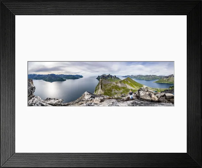 Framed Print : Man with camera photographing Hesten and Inste Kongen mountains standing on Segla peak