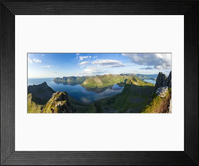 Framed Print : Aerial view of Husfjellet mountain and Devils Teeth peaks reflected in the fjord Framed Print : Aerial view of Husfjellet mountain and Devils Teeth peaks reflected in the fjord