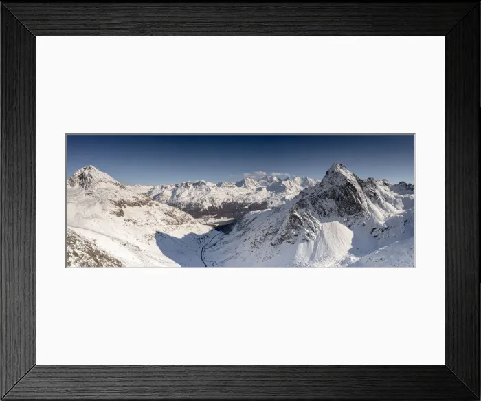 Framed Print : Aerial view of Julier Pass mountain road in the snow leading to St Framed Print : Aerial view of Julier Pass mountain road in the snow leading to St