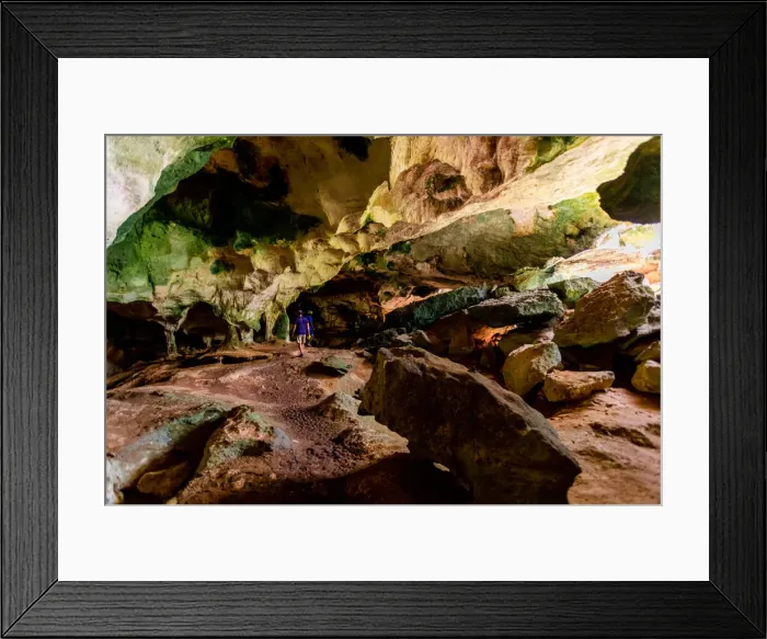 Framed Print : Man exploring sea caves on North Caicos, Turks and Caicos Islands, Atlantic Framed Print : Man exploring sea caves on North Caicos, Turks and Caicos Islands, Atlantic