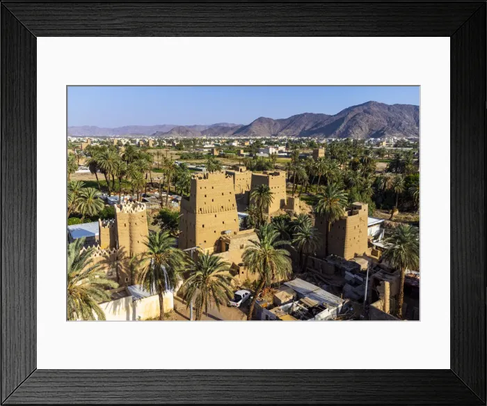 Framed Print : Aerial of traditional build mud towers used as living homes, Najran Framed Print : Aerial of traditional build mud towers used as living homes, Najran