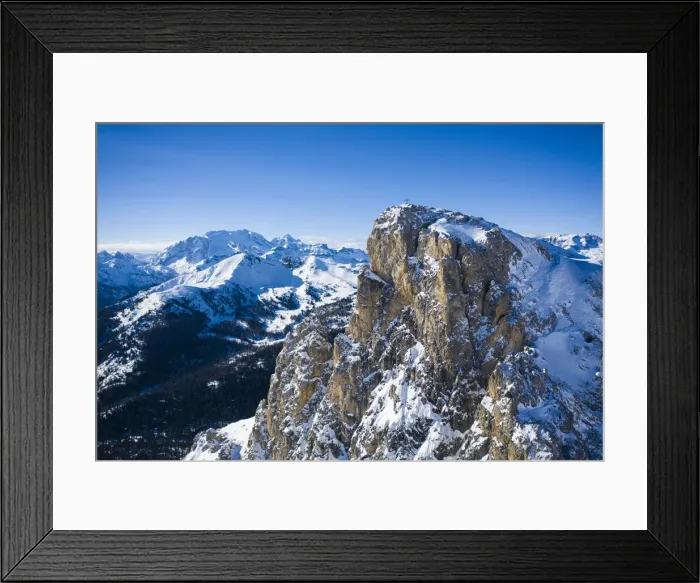 Framed Print : Aerial view of Sass de Stria mountain peak with Marmolada covered with snow in Framed Print : Aerial view of Sass de Stria mountain peak with Marmolada covered with snow in
