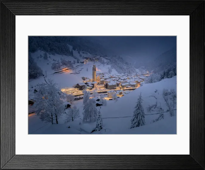 Framed Print : Winter dusk over the illuminated village in deep snow, Gerola Alta, Valgerola Framed Print : Winter dusk over the illuminated village in deep snow, Gerola Alta, Valgerola
