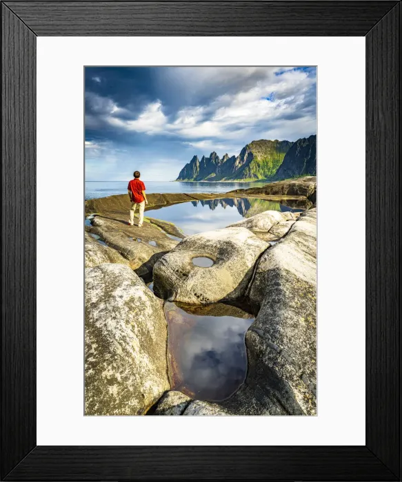 Framed Print : Hiker man contemplating the sharp rocks of mountain peaks standing beside rock pools Framed Print : Hiker man contemplating the sharp rocks of mountain peaks standing beside rock pools