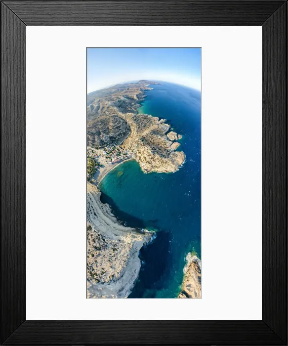 Framed Print : Aerial panoramic view of cliffs surrounding the beach of Matala seaside town, Crete Framed Print : Aerial panoramic view of cliffs surrounding the beach of Matala seaside town, Crete