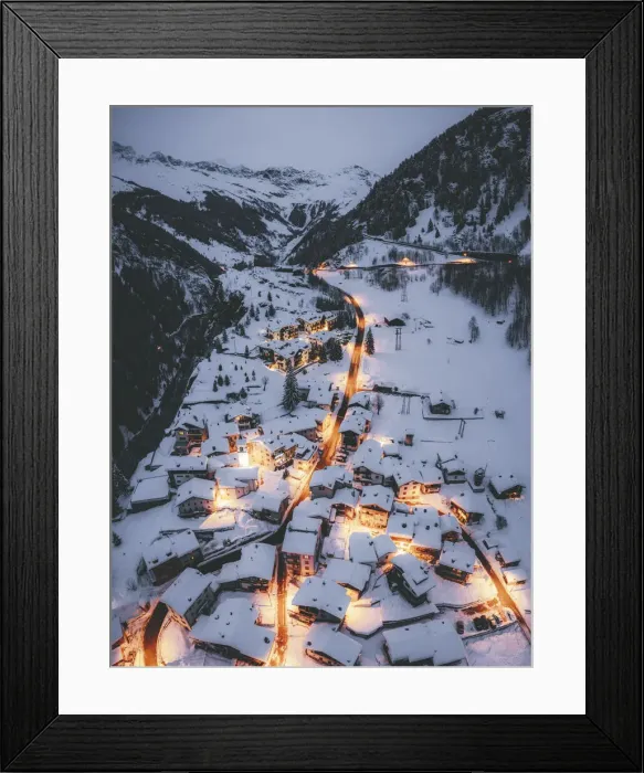 Framed Print : Aerial view of illuminated mountain huts covered with snow, Pianazzo, Madesimo Framed Print : Aerial view of illuminated mountain huts covered with snow, Pianazzo, Madesimo
