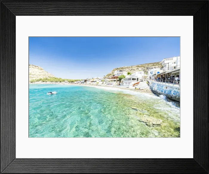 Framed Print : Beach of the seaside town resort of Matala washed by turquoise sea, Crete, Greek Islands Framed Print : Beach of the seaside town resort of Matala washed by turquoise sea, Crete, Greek Islands