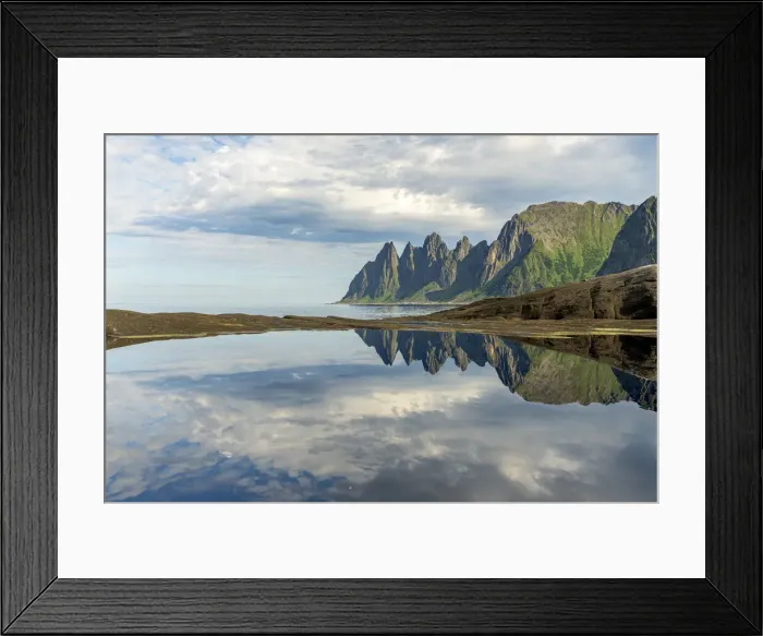 Framed Print : Cloudy sky over majestic rocks of mountain peaks mirrored in water, Tungeneset, Senja Framed Print : Cloudy sky over majestic rocks of mountain peaks mirrored in water, Tungeneset, Senja