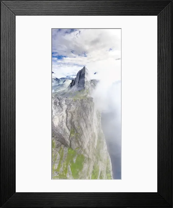 Framed Print : Aerial view of two hikers walking towards the scenic Segla Mountain in a sea of clouds Framed Print : Aerial view of two hikers walking towards the scenic Segla Mountain in a sea of clouds