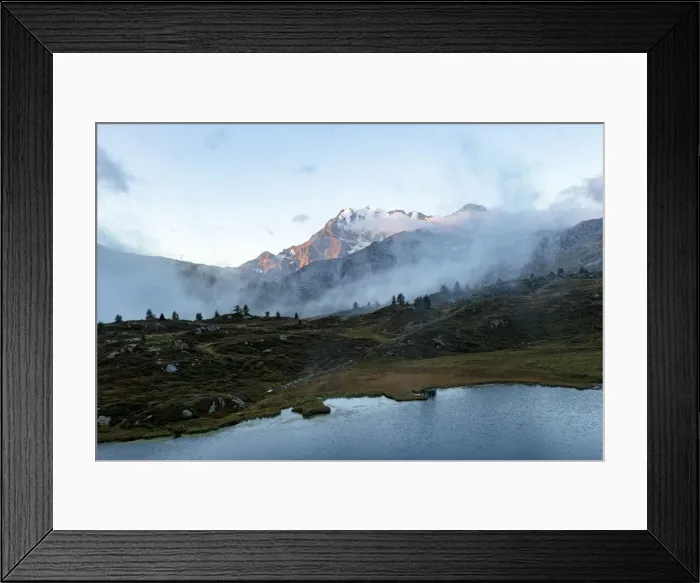 Framed Print : Aerial view of Fletschhorn and Galehorn mountains in fog at dawn from Hopschusee lake Framed Print : Aerial view of Fletschhorn and Galehorn mountains in fog at dawn from Hopschusee lake