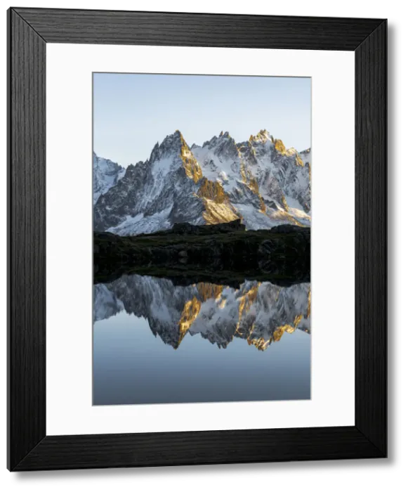 Framed Print : Rocky peaks of Aiguilles de Chamonix reflected in Lacs des Cheserys at sunset Framed Print : Rocky peaks of Aiguilles de Chamonix reflected in Lacs des Cheserys at sunset