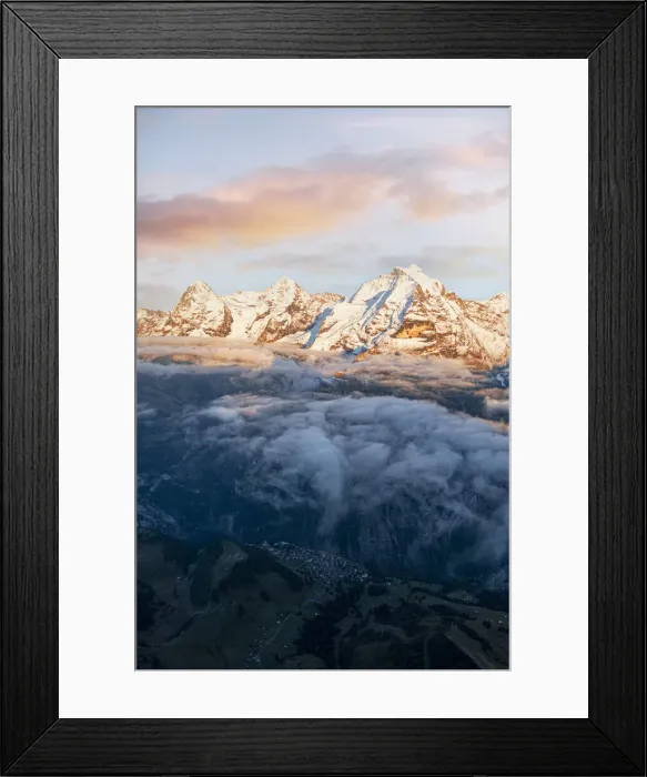 Framed Print : Aerial view of snowcapped peaks of Eiger, Monch and Jungfrau in fog at sunset Framed Print : Aerial view of snowcapped peaks of Eiger, Monch and Jungfrau in fog at sunset