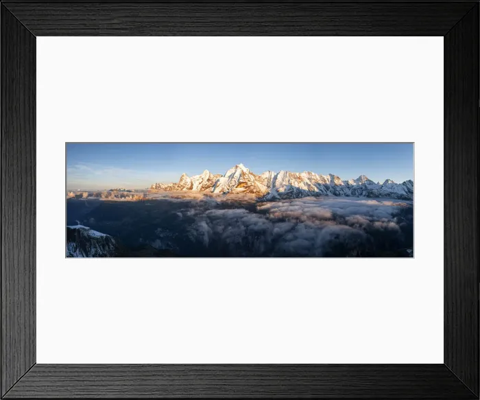 Framed Print : Foggy sky at sunset over majestic rocks of Eiger, Monch and Jungfrau mountains