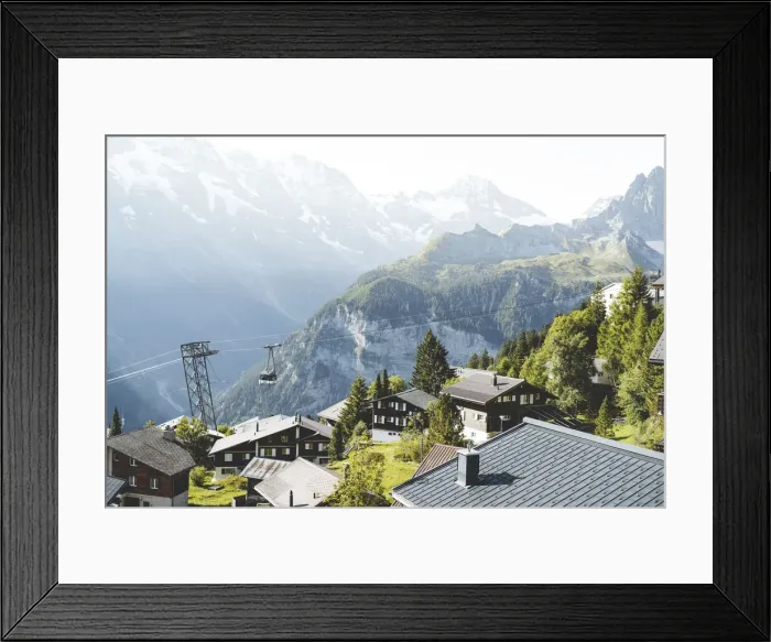 Framed Print : Schilthorn cableway passing over the alpine village of Murren, Jungfrau Region Framed Print : Schilthorn cableway passing over the alpine village of Murren, Jungfrau Region