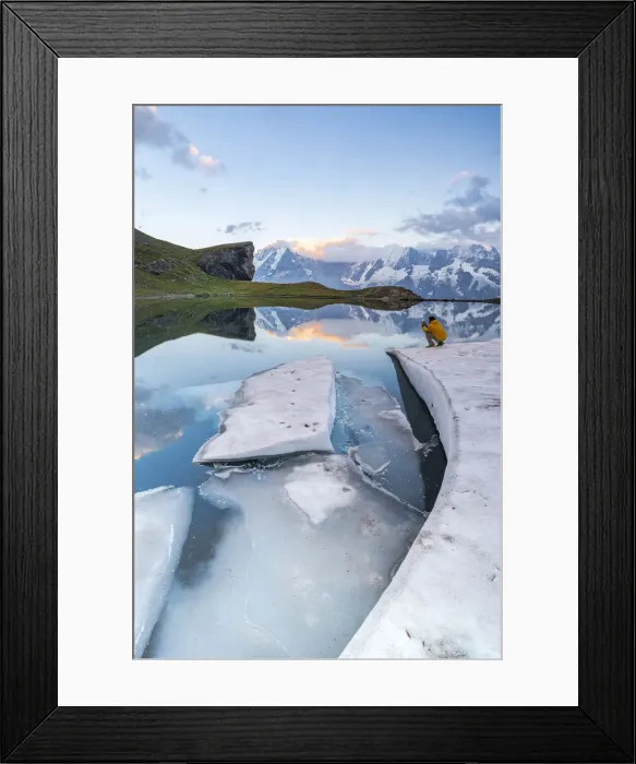 Framed Print : Man photographing Jungfrau mountain from frozen shores of Grauseeli lake at sunset Framed Print : Man photographing Jungfrau mountain from frozen shores of Grauseeli lake at sunset