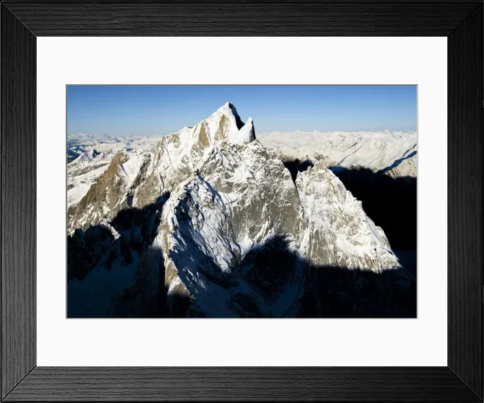 Framed Print : Aerial view of Pizzo Cengalo mountain peak covered with snow, Val Masino, Valtellina Framed Print : Aerial view of Pizzo Cengalo mountain peak covered with snow, Val Masino, Valtellina