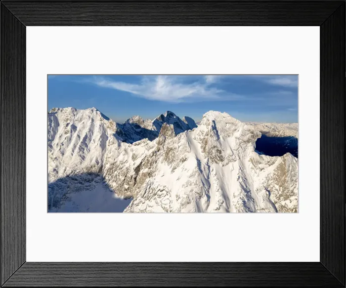 Framed Print : Majestic rock pinnacles of Pioda Di Sciora peak covered with snow, aerial view Framed Print : Majestic rock pinnacles of Pioda Di Sciora peak covered with snow, aerial view