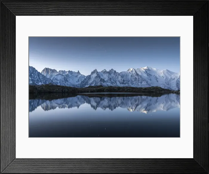 Framed Print : Lacs des Cheserys lake and peaks of Mont Blanc massif covered with snow at night Framed Print : Lacs des Cheserys lake and peaks of Mont Blanc massif covered with snow at night