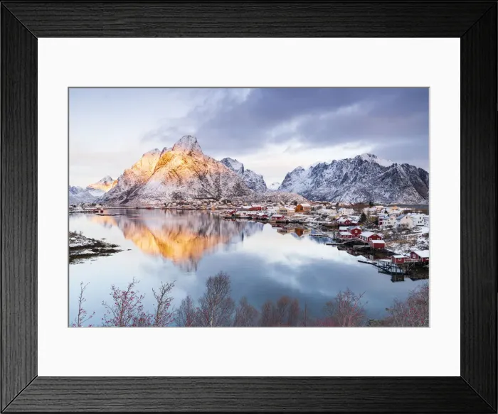 Framed Print : Red Rorbu cabins by the sea with Mount Olstind in the background, Reine Bay Framed Print : Red Rorbu cabins by the sea with Mount Olstind in the background, Reine Bay