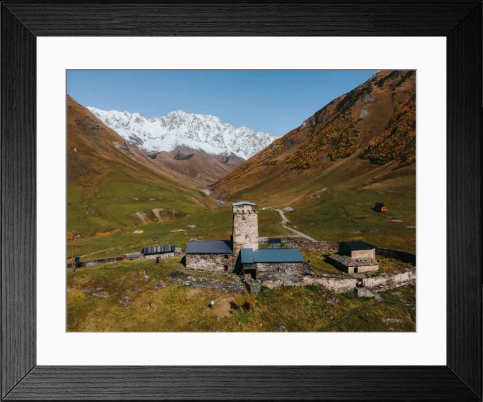 Framed Print : View of Mount Shkhara with the iconic Church of St. George, Ushguli, Mestia Framed Print : View of Mount Shkhara with the iconic Church of St. George, Ushguli, Mestia